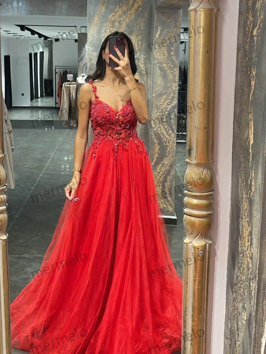 Elegant Spaghetti-Strap Mermaid Prom Dress with Appliques and Beadings